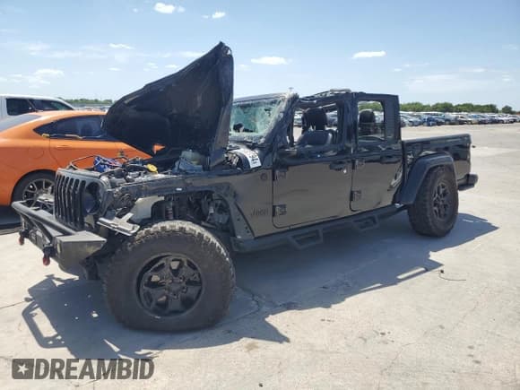 ✅ 2021 Jeep Gladiator Freedom • VIN: 1C6HJTAG0ML587535 • Лот: 60682794. Опубликован ранее на Copart с пробегом 62 270 миль. Бесплатный доступ к архиву аукционных продаж из США и подробный отчёт об истории автомобиля на DreamBid. Изображение 1.