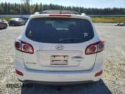 ✅ 2012 Hyundai Santa Fe SE • VIN: 5XYZH4AG4CG110518 • Lot: 77423244. Listed on Copart with 170,903 mi. Free auction sales archive from the USA and detailed vehicle history report at DreamBid. Image 6.