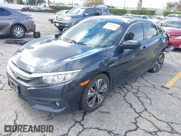 ✅ 2018 Honda Civic EX-T • VIN: JHMFC1F31JX028633 • Лот: 43712826. Опубликован ранее на IAAI с пробегом 155 736 миль. Бесплатный доступ к архиву аукционных продаж из США и подробный отчёт об истории автомобиля на DreamBid. Изображение 17.