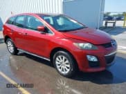 ✅ 2012 Mazda CX-7 i SV • VIN: JM3ER2A52C0411784 • Lot: 43091579. Wystawiony na IAAI z przebiegiem 289 673 mil. Bezpłatny archiwum sprzedaży aukcyjnych z USA i szczegółowy raport historii pojazdu na DreamBid. Zdjęcie 1.