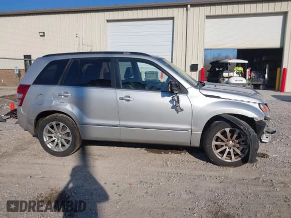 ✅ 2013 Suzuki Grand Vitara Limited • VIN: JS3TE0D74D4100091 • Lot: 41684748. Listed on IAAI with 176,696 mi. Free auction sales archive from the USA and detailed vehicle history report at DreamBid. Image 14.