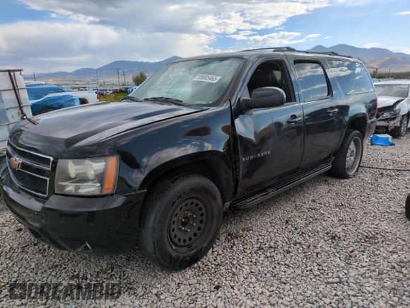 2010 Chevrolet Suburban LT z VIN 1GNUKJE35AR159623, wystawiony jako Copart lot #65005465 z przebiegiem 248 278 mil mil oraz Szkoda całkowita • Salvage title. Historia ofert i sprzedaży dostępna na DreamBid. Obrazek 1.