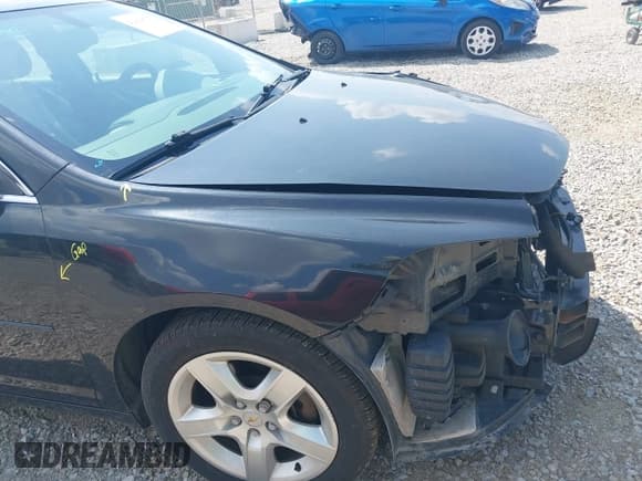 ✅ 2012 Chevrolet Malibu 1LS • VIN: 1G1ZB5E05CF321405 • Lot: 42998627. Listed on IAAI with 200,623 mi. Free auction sales archive from the USA and detailed vehicle history report at DreamBid. Image 14.