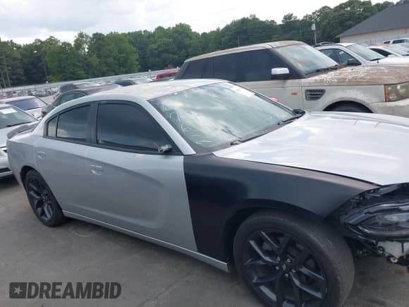 ✅ 2023 Dodge Charger SXT • VIN: 2C3CDXBG4PH508762 • Lot: 43052768. Listed on IAAI with 39,616 mi. Free auction sales archive from the USA and detailed vehicle history report at DreamBid. Image 12.