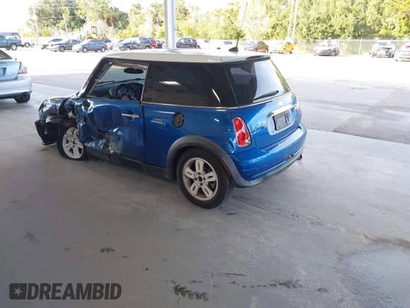 ✅ 2006 MINI Hardtop • VIN: WMWRC33536TK65507 • Lot: 43619853. Listed on IAAI with 247,733 mi. Free auction sales archive from the USA and detailed vehicle history report at DreamBid. Image 3.