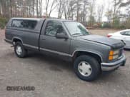 ✅ 1998 GMC Sierra 1500 • VIN: 1GTEK14M4WZ530821 • Lot: 43744352. Listed on IAAI with 356,671 mi. Free auction sales archive from the USA and detailed vehicle history report at DreamBid. Image 1.