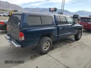 ✅ 2002 Dodge Dakota SLT • VIN: 1B7HG48N32S720700 • Lot: 80234494. Wystawiony na Copart z przebiegiem 207 035 mil. Bezpłatny archiwum sprzedaży aukcyjnych z USA i szczegółowy raport historii pojazdu na DreamBid. Zdjęcie 3.