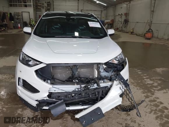 ✅ 2022 Ford Edge SEL • VIN: 2FMPK4J96NBA59780 • Lot: 41940804. Wystawiony na IAAI z przebiegiem 77 325 mil. Bezpłatny archiwum sprzedaży aukcyjnych z USA i szczegółowy raport historii pojazdu na DreamBid. Zdjęcie 6.