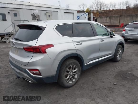 ✅ 2019 Hyundai Santa Fe SE • VIN: 5NMS2CAD7KH054274 • Lot: 43694931. Listed on IAAI with 96,329 mi. Free auction sales archive from the USA and detailed vehicle history report at DreamBid. Image 4.