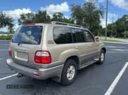 ✅ 1998 Lexus LX 470 • VIN: JT6HT00W7W0008417 • Lot: 79324334. Wystawiony na Copart z przebiegiem 183 911 mil. Bezpłatny archiwum sprzedaży aukcyjnych z USA i szczegółowy raport historii pojazdu na DreamBid. Zdjęcie 4.
