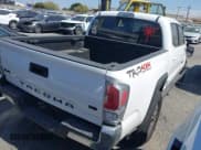 ✅ 2023 Toyota Tacoma SR • VIN: 3TMCZ5AN6PM574443 • Lot: 42875620. Listed on IAAI with 13,232 mi. Free auction sales archive from the USA and detailed vehicle history report at DreamBid. Image 4.