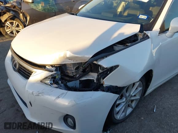 ✅ 2012 Lexus CT 200h Premium • VIN: JTHKD5BH7C2085763 • Lot: 43574198. Listed on IAAI with 203,205 mi. Free auction sales archive from the USA and detailed vehicle history report at DreamBid. Image 6.