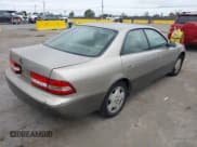 ✅ 2000 Lexus ES 300 • VIN: JT8BF28G4Y5094384 • Lot: 43322210. Listed on IAAI with 176,678 mi. Free auction sales archive from the USA and detailed vehicle history report at DreamBid. Image 4.