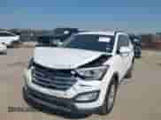 2014 Hyundai Santa Fe with VIN 5XYZU3LA7EG183450, listed as a IAAI auction lot 43218232 with 102,132 mi miles and . Bid and sale history available at DreamBid. Image 2.