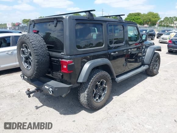✅ 2020 Jeep Wrangler Unlimited Sport • VIN: 1C4HJXDG1LW201374 • Lot: 42160354. Listed on IAAI with 46,539 mi. Free auction sales archive from the USA and detailed vehicle history report at DreamBid. Image 4.