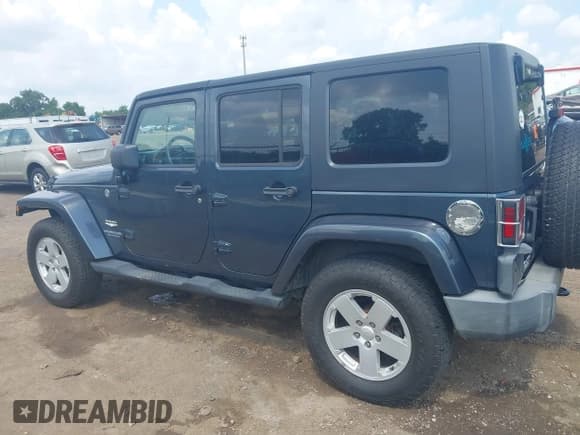 ✅ 2007 Jeep Wrangler Unlimited Sahara • VIN: 1J4GA591X7L117415 • Lot: 42509979. Listed on IAAI with 96,192 mi. Free auction sales archive from the USA and detailed vehicle history report at DreamBid. Image 15.