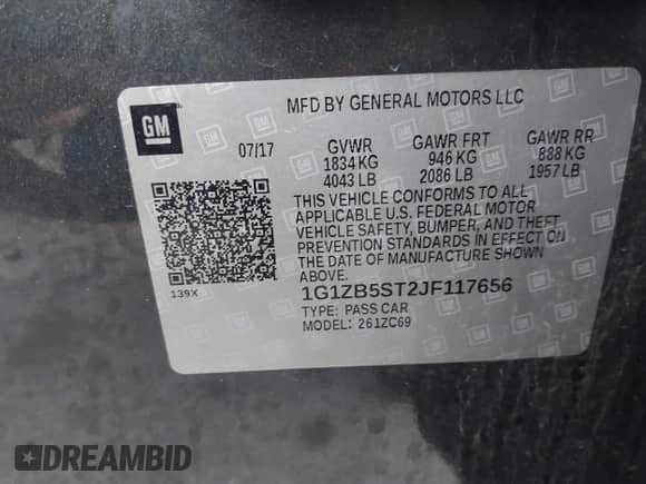 2018 Chevrolet Malibu LS z VIN 1G1ZB5ST2JF117656, wystawiony jako IAAI lot #42434210 z przebiegiem 90 785 mil mil oraz . Historia ofert i sprzedaży dostępna na DreamBid. Obrazek 9.