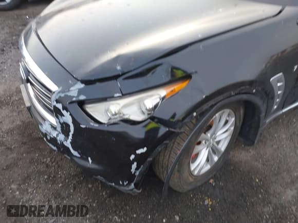 ✅ 2014 Infiniti QX70 • VIN: JN8CS1MW1EM410287 • Лот: 41321076. Опубликован ранее на IAAI с пробегом Не указан. Бесплатный доступ к архиву аукционных продаж из США и подробный отчёт об истории автомобиля на DreamBid. Изображение 6.