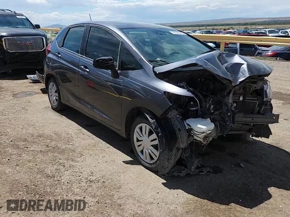 ✅ 2015 Honda Fit LX • VIN: 3HGGK5G59FM738510 • Lot: 70696295. Listed on Copart with 82,562 mi. Free auction sales archive from the USA and detailed vehicle history report at DreamBid. Image 14.