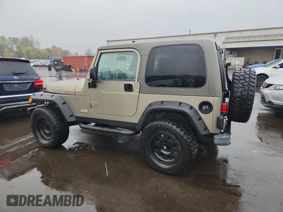 ✅ 2004 Jeep Wrangler Rubicon • VIN: 1J4FA69S14P800280 • Lot: 82372155. Wystawiony na Copart z przebiegiem 38 663 mil. Bezpłatny archiwum sprzedaży aukcyjnych z USA i szczegółowy raport historii pojazdu na DreamBid. Zdjęcie 2.
