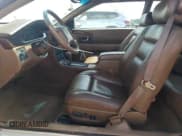 ✅ 1998 Cadillac Eldorado Touring • VIN: 1G6ET1298WU606293 • Lot: 68511745. Listed on Copart with 48,592 mi. Free auction sales archive from the USA and detailed vehicle history report at DreamBid. Image 7.