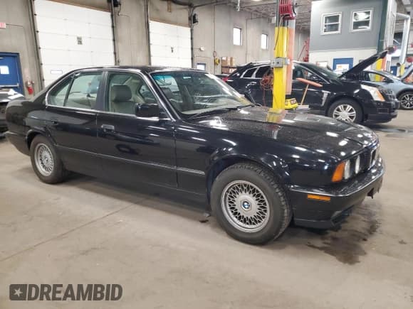 ✅ 1994 BMW 5 Series • VIN: WBAHE6321RGF28770 • Lot: 58703485. Listed on Copart with 96,794 mi. Free auction sales archive from the USA and detailed vehicle history report at DreamBid. Image 4.