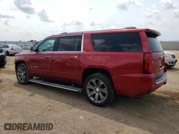 2015 Chevrolet Suburban LTZ с VIN 1GNSKKKC6FR556105, выставлен на аукционе Copart как лот 64034304 с пробегом 106 269 миль миль и Списание • Salvage title. История ставок и продаж доступна на DreamBid. Изображение 2.