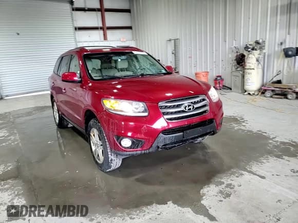 ✅ 2012 Hyundai Santa Fe Limited • VIN: 5XYZK3AB5CG133998 • Lot: 84607764. Listed on Copart with 144,912 mi. Free auction sales archive from the USA and detailed vehicle history report at DreamBid. Image 14.
