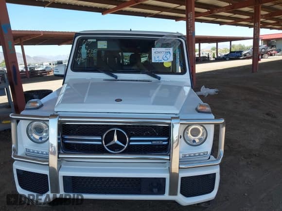 ✅ 2015 Mercedes-Benz G 63 AMG • VIN: WDCYC7DF5FX234579 • Lot: 42057392. Listed on IAAI with 124,585 mi. Free auction sales archive from the USA and detailed vehicle history report at DreamBid. Image 12.