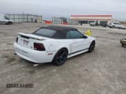 ✅ 2004 Ford Mustang Deluxe • VIN: 1FAFP44694F208401 • Lot: 43871483. Listed on IAAI with 133,344 mi. Free auction sales archive from the USA and detailed vehicle history report at DreamBid. Image 4.