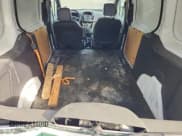 ✅ 2015 Ford Transit Connect XL • VIN: NM0LE7E74F1206242 • Lot: 64771195. Wystawiony na Copart z przebiegiem 239 011 mil. Bezpłatny archiwum sprzedaży aukcyjnych z USA i szczegółowy raport historii pojazdu na DreamBid. Zdjęcie 10.