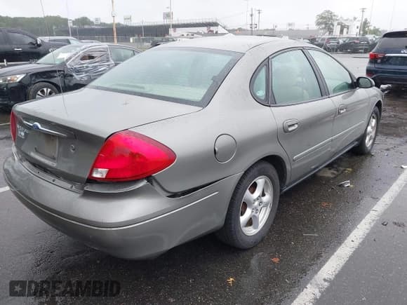 ✅ 2002 Ford Taurus SES Standard • VIN: 1FAFP55U12G230323 • Лот: 43027316. Опубликован ранее на IAAI с пробегом 78 495 миль. Бесплатный доступ к архиву аукционных продаж из США и подробный отчёт об истории автомобиля на DreamBid. Изображение 4.