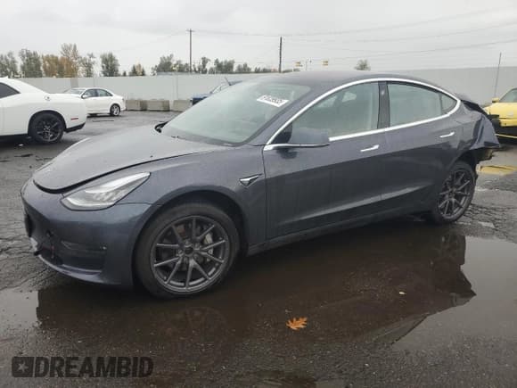 ✅ 2018 Tesla Model 3 Long Range Battery • VIN: 5YJ3E1EB0JF104215 • Lot: 91839935. Listed on Copart with 33,940 mi. Free auction sales archive from the USA and detailed vehicle history report at DreamBid. Image 1.