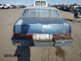 ✅ 1988 Cadillac Seville • VIN: 1G6KS5152JU809989 • Lot: 51385205. Wystawiony na Copart z przebiegiem 40 217 mil. Bezpłatny archiwum sprzedaży aukcyjnych z USA i szczegółowy raport historii pojazdu na DreamBid. Zdjęcie 6.