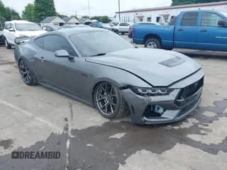 ✅ 2024 Ford Mustang GT • VIN: 1FA6P8CF8R5411835 • Lot: 42331556. Listed on IAAI with 26,526 mi. Free auction sales archive from the USA and detailed vehicle history report at DreamBid. Image 1.