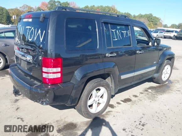 ✅ 2012 Jeep Liberty Sport • VIN: 1C4PJLAK1CW201209 • Lot: 43618956. Listed on IAAI with 145,206 mi. Free auction sales archive from the USA and detailed vehicle history report at DreamBid. Image 4.