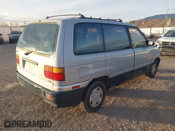 ✅ 1991 Mazda MPV • VIN: JM3LV522XM0328615 • Lot: 43794334. Listed on IAAI with 50,551 mi. Free auction sales archive from the USA and detailed vehicle history report at DreamBid. Image 4.