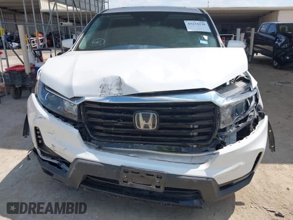 ✅ 2023 Honda Ridgeline RTL-E • VIN: 5FPYK3F72PB035287 • Lot: 43234228. Listed on IAAI with 15,634 mi. Free auction sales archive from the USA and detailed vehicle history report at DreamBid. Image 6.