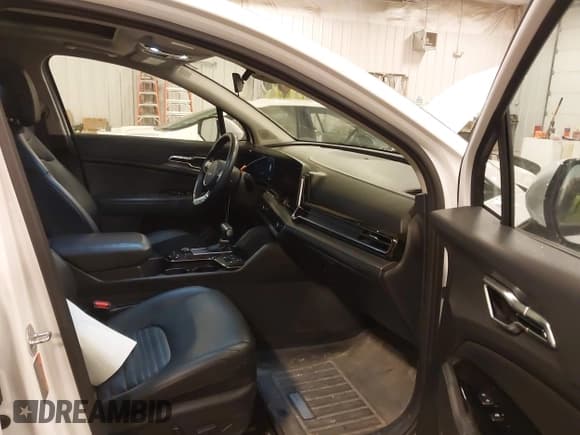 ✅ 2023 Kia Sportage SX-Prestige • VIN: 5XYK5CAF5PG102154 • Лот: 42026995. Опубликован ранее на IAAI с пробегом 50 987 миль. Бесплатный доступ к архиву аукционных продаж из США и подробный отчёт об истории автомобиля на DreamBid. Изображение 5.