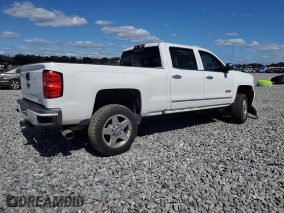 ✅ 2015 Chevrolet Silverado 2500HD High Country • VIN: 1GC1KXE85FF677959 • Lot: 90101215. Listed on Copart with 146,383 mi. Free auction sales archive from the USA and detailed vehicle history report at DreamBid. Image 3.