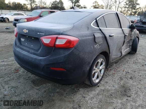 ✅ 2018 Chevrolet Cruze Premier • VIN: 1G1BF5SM0J7203282 • Лот: 70757222. Опубликован ранее на Copart с пробегом 165 005 миль. Бесплатный доступ к архиву аукционных продаж из США и подробный отчёт об истории автомобиля на DreamBid. Изображение 3.