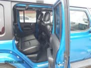 ✅ 2023 Jeep Wrangler Sahara • VIN: 1C4JJXP63PW579805 • Lot: 43401399. Listed on IAAI with 41,989 mi. Free auction sales archive from the USA and detailed vehicle history report at DreamBid. Image 8.