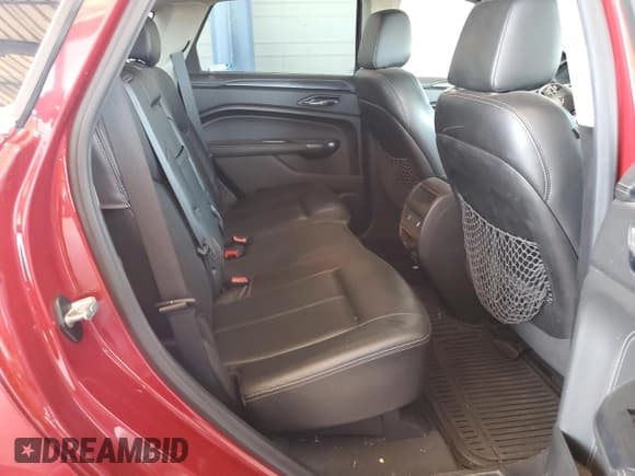 ✅ 2013 Cadillac SRX • VIN: 3GYFNAE3XDS623879 • Lot: 66413945. Listed on Copart with 142,042 mi. Free auction sales archive from the USA and detailed vehicle history report at DreamBid. Image 11.