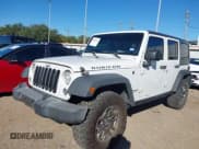 ✅ 2017 Jeep Wrangler Unlimited Rubicon • VIN: 1C4BJWFG3HL597572 • Lot: 40877947. Wystawiony na IAAI z przebiegiem 162 923 mil. Bezpłatny archiwum sprzedaży aukcyjnych z USA i szczegółowy raport historii pojazdu na DreamBid. Zdjęcie 2.