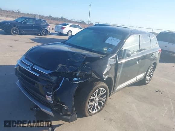 ✅ 2016 Mitsubishi Outlander SE • VIN: JA4AZ3A32GZ041928 • Lot: 43679611. Listed on IAAI with 140,310 mi. Free auction sales archive from the USA and detailed vehicle history report at DreamBid. Image 2.