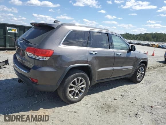 ✅ 2015 Jeep Grand Cherokee Limited • VIN: 1C4RJEBGXFC737211 • Lot: 70911715. Listed on Copart with 243,640 mi. Free auction sales archive from the USA and detailed vehicle history report at DreamBid. Image 3.