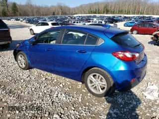 2017 Chevrolet Cruze LT z VIN 3G1BE6SM2HS549323, wystawiony jako Copart lot #68322312 z przebiegiem 121 635 mil mil oraz . Historia ofert i sprzedaży dostępna na DreamBid. Obrazek 2.