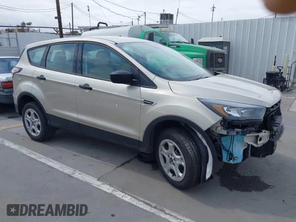 ✅ 2018 Ford Escape S • VIN: 1FMCU0F76JUA99595 • Lot: 42369434. Listed on IAAI with 19,207 mi. Free auction sales archive from the USA and detailed vehicle history report at DreamBid. Image 1.