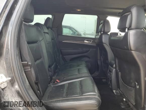 2014 Jeep Grand Cherokee Limited z VIN 1C4RJFBM6EC386677, wystawiony jako Copart lot #68103665 z przebiegiem 152 554 mil mil oraz Szkoda całkowita • Salvage title. Historia ofert i sprzedaży dostępna na DreamBid. Obrazek 11.