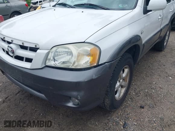 ✅ 2005 Mazda Tribute i • VIN: 4F2YZ92Z75KM42150 • Lot: 42703391. Listed on IAAI with 187,595 mi. Free auction sales archive from the USA and detailed vehicle history report at DreamBid. Image 6.